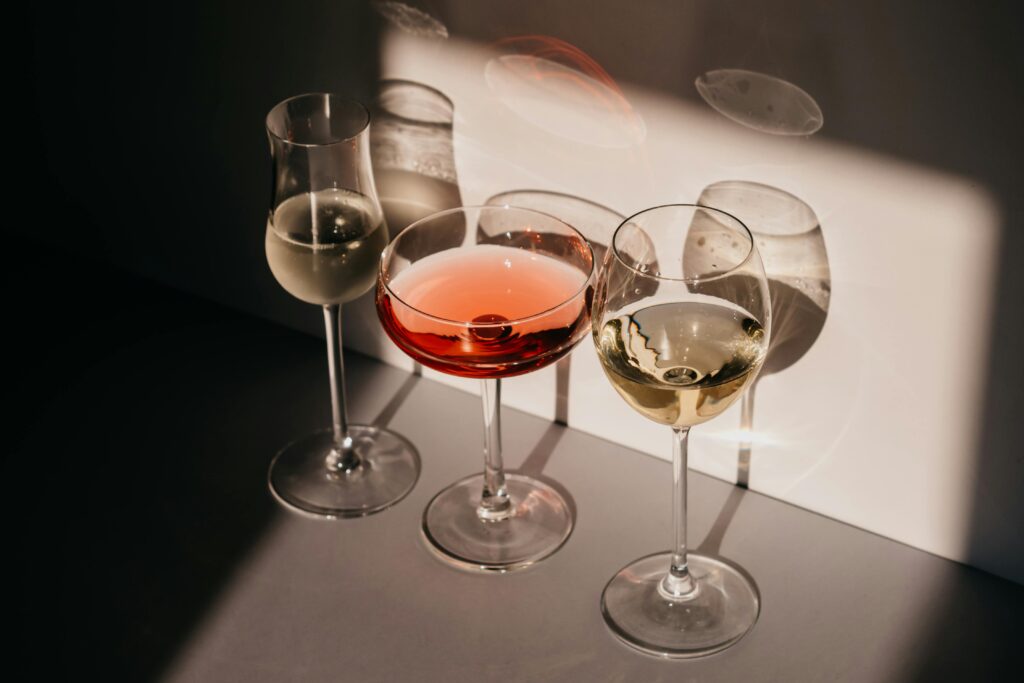 A photo of three wine glasses.